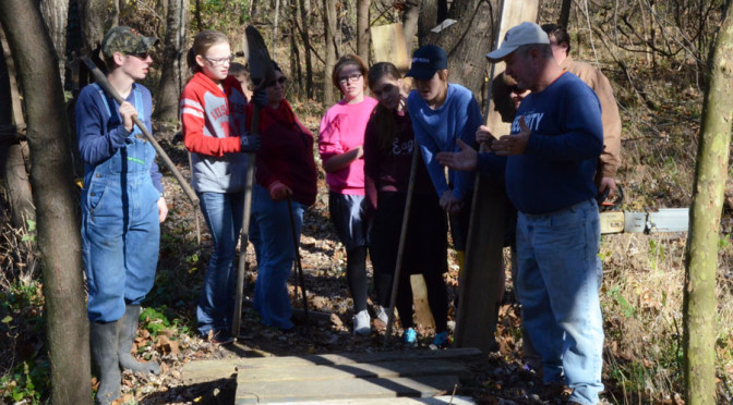 Christian Heights students work on Gunn Park trails for fundraiser