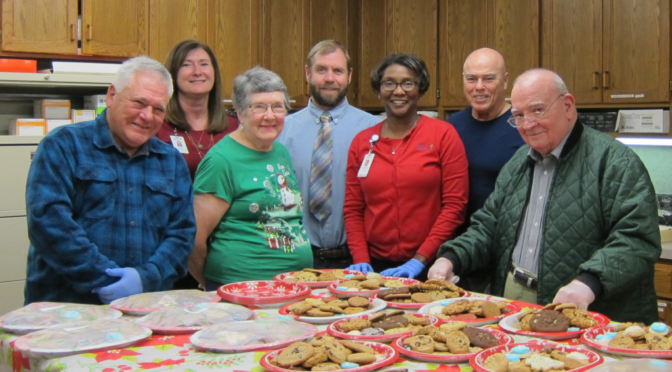 Mercy Hospice volunteers make annual cookie trays
