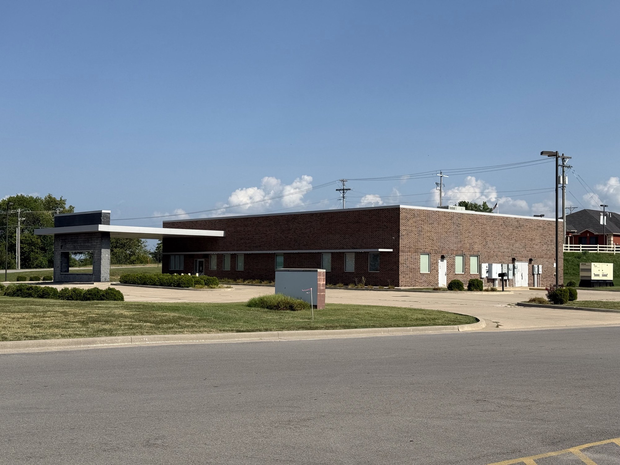 The vacant former dialysis building at 2526 S. Main, Fort Scott, with an empty parking lot