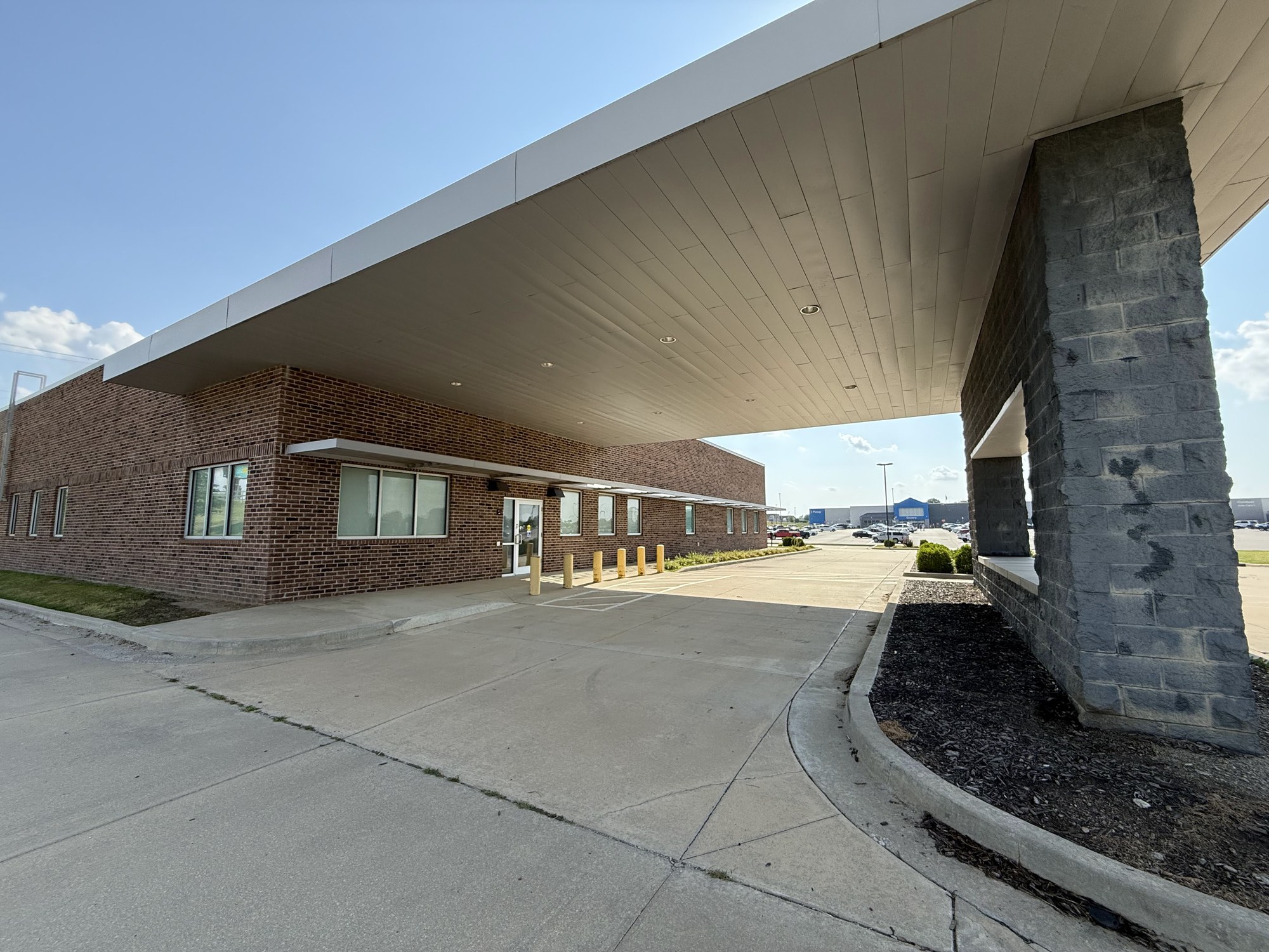The entrance canopy at 2526 S. Main with the Fort Scott Walmart Supercenter behind it